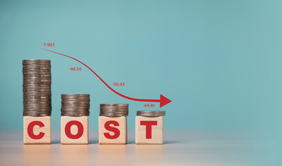 Stacked coins decreasing with cost down concept and downward arrow symbolizing cost reduction expense control financial efficiency budget management business savings and profitability improvement