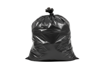 Full black trash bag tied tightly with light shining dramatically on its surface