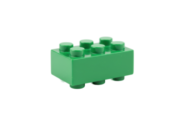 Isolated green building block on matching toned surface showcasing construction toy part