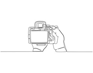 Continuous line drawing of hand holding camera. Single line illustration of hand hold camera. Photograph, journalist concept. Editable outline