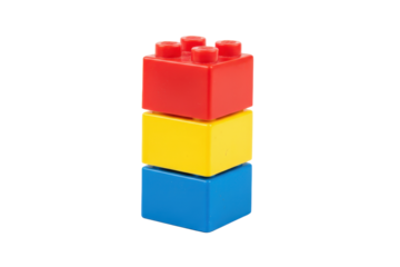 Primary colored toy building blocks stacked vertically creating a simple foundation for imagination