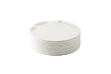 Stack of blank white circular tags or labels neatly arranged against a bright backdrop