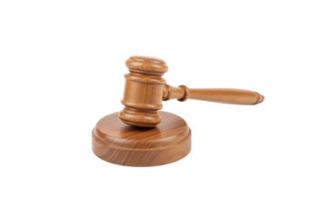 Symbol of justice the wooden gavel resting on its sounding block with a soft glowing aura