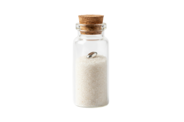 Tiny glass vial with fine white sand and a metallic object inside sealed with a cork