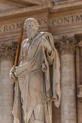 Obraz premium Vatican - Vatican City - St Peters Square - Statue of Saint Paul holding sword in front of St Peters Basilica facade
