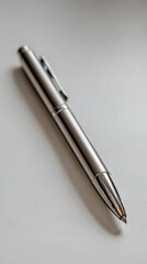 Elegant White Pen with Silver Accents on Minimalist White Background