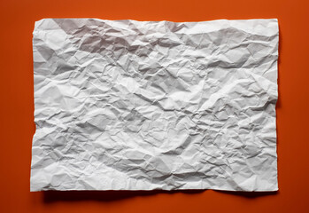 Obraz premium Crumpled white paper texture on orange background representing imperfection, creativity, minimal abstract design concept for branding, posters, mockups, and modern layouts.