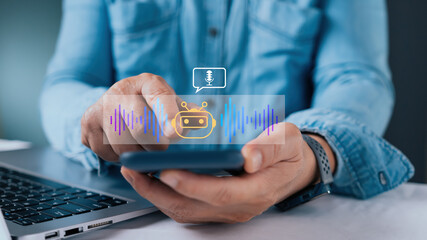 Man hands using smartphone with virtual AI voice assistant robot icon. Concept of speech recognition, audio sound wave technology, smart chatbot application and digital communication.