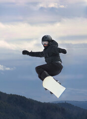 child snowbording during winter in quebec canada