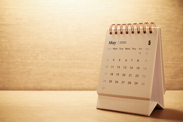 Calendar page of May 2026 on desk, with copy space. monthly planning concept, important schedules, meetings, and appointments.
