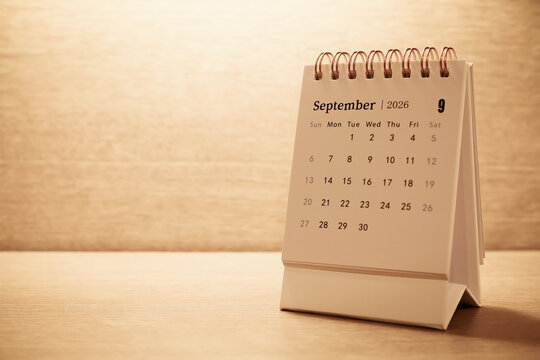 Calendar page of September 2026 on desk, with copy space. monthly planning concept, important schedules, meetings, and appointments.