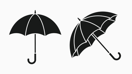 Two black umbrella icons one upright and one tilted on transparent background © Rabbi