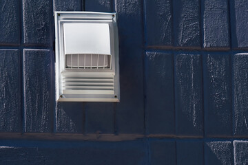 Street lighting.White urban LED lantern on dark tiled wall