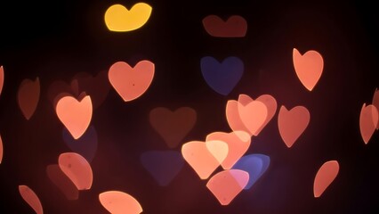 Colorful Heart Shaped Bokeh Lights on Dark Background for Valentine Day Abstract Concept Valentines day