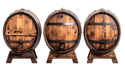 Three wooden barrels with metal bands stand on wooden stands, against a black backdrop