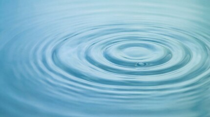 Circular ripples expand outwards across the tranquil surface of clear water, creating a mesmerizing display of concentric waves and evoking a sense of calm and purity.