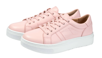 Pair of pale pink sneakers with white soles, laces, and leather uppers