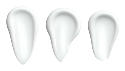 Three white cosmetic cream swatches, teardrop shapes, on a black background, with gloss