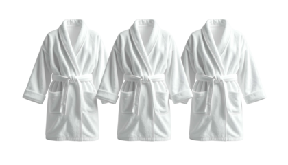 Three plush, white bathrobes, tied at the waist, stand arranged on a plain background
