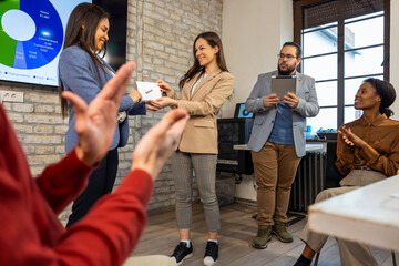 Young professionals receiving awards at conference