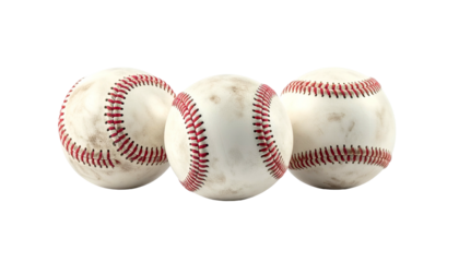 Three baseballs on a black background, slightly worn, showcasing stitching details