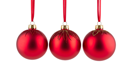 Three identical red Christmas ornaments with gold caps and ribbon on black background