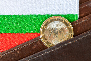 A new Bulgarian 1 euro coin in your wallet. A symbol of Bulgaria. Business and financial concept. Expansion of the euro zone in the European Union. Close up