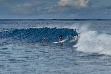 Obraz premium Punta Carola, home to one of the most famous and challenging surf breaks on San Cristóbal Island. Known for its powerful right-hand reef break, this spot is a favorite for experienced surfers seeking 