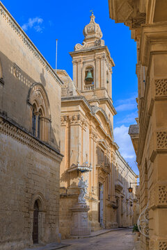 Mdina townscape, Malta: Villegaignon Street with the Annunciation Church.The Latin phrase "(Ecce) signum salutis, salus in periculis" means "(Behold) the sign of salvation, salvation in danger."
