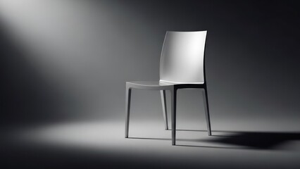 A white chair with a minimalist design, placed in a dimly lit room with a spotlight casting a shadow on the floor.