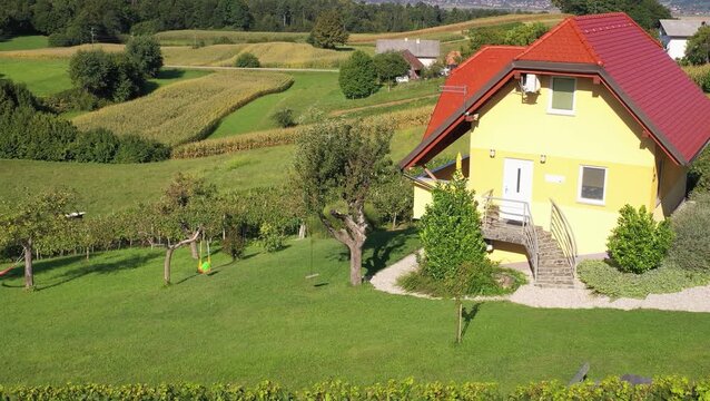 Aerial view of countryside house and vineyard landscape near Mokrice