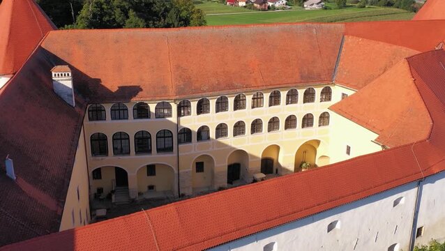 Aerial view of historic building near vineyards in Mokrice, Slovenia