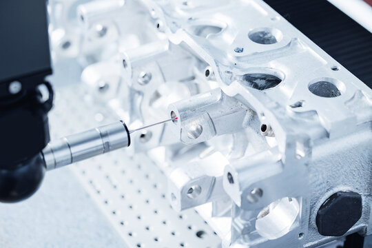 Cnc coordinate measuring machine inspecting engine block for precision engineering