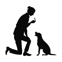 Silhouette of woman kneeling with dog on a white backgrond