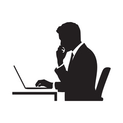 A silhouette of a businessman intently working on a laptop at a desk