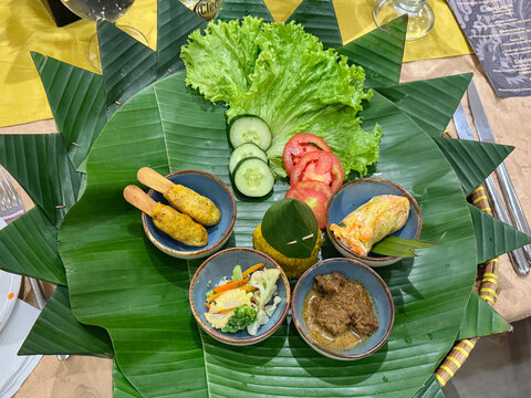 Colorful displayed dish of food from Indonesian cuisine in restaurant