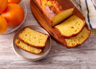 orange cake, sliced and served