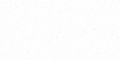 A textured white background with a grainy speckled and slightly rough surface