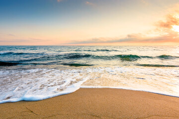 sand beach at the sea for summer vacation concept. beautiful sunrise at perfect bulgaria coast with calm waves and clouds on sky. beautiful morning landscape for holiday and travel background