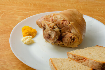 Cooked pork knuckle on plate