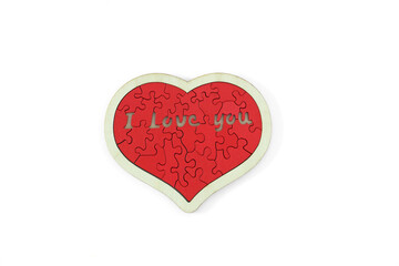 Obraz premium I love you wooden puzzle, white background, heart shape