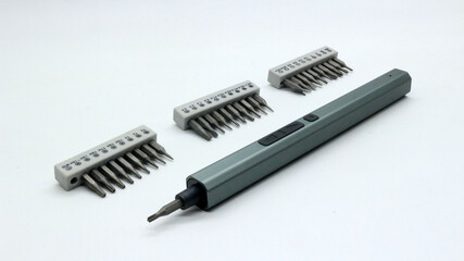 Electric screwdriver with screwdriver bit on white background