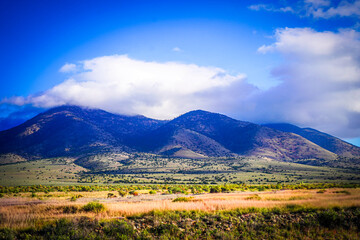 Fototapeta premium mountains, plains, river haze