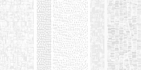 Obraz premium Abstract white textured background with vertical striped pattern and scribble details