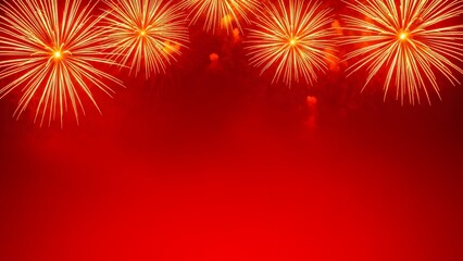 Vibrant red fireworks exploding in night sky with bright lights and sparks