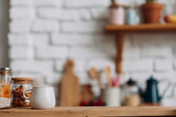 countertop with blurred home kitchen background, kitchen tabletop with copy space over blurred kitchen in background