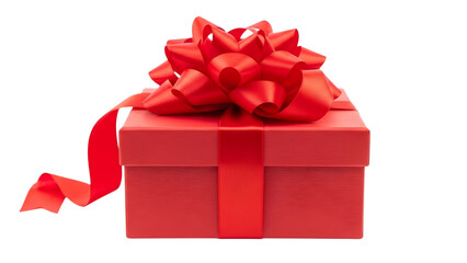 Obraz premium A vibrant red gift box with a large, ornate bow isolated on a black background.