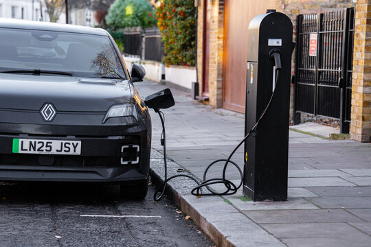 EV Renault 5 E-Tech Front View, Electric Vehicle Supply Equipment (EVSE), Car Public Kerbside Charging Station, London, England, UK, Britain &ndash; January 2026