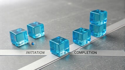 Translucent blue cubes arranged in a structured progression from initiation to completion on a clean surface