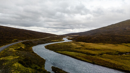 Aerial view of river snaking through the mountains in Iceland